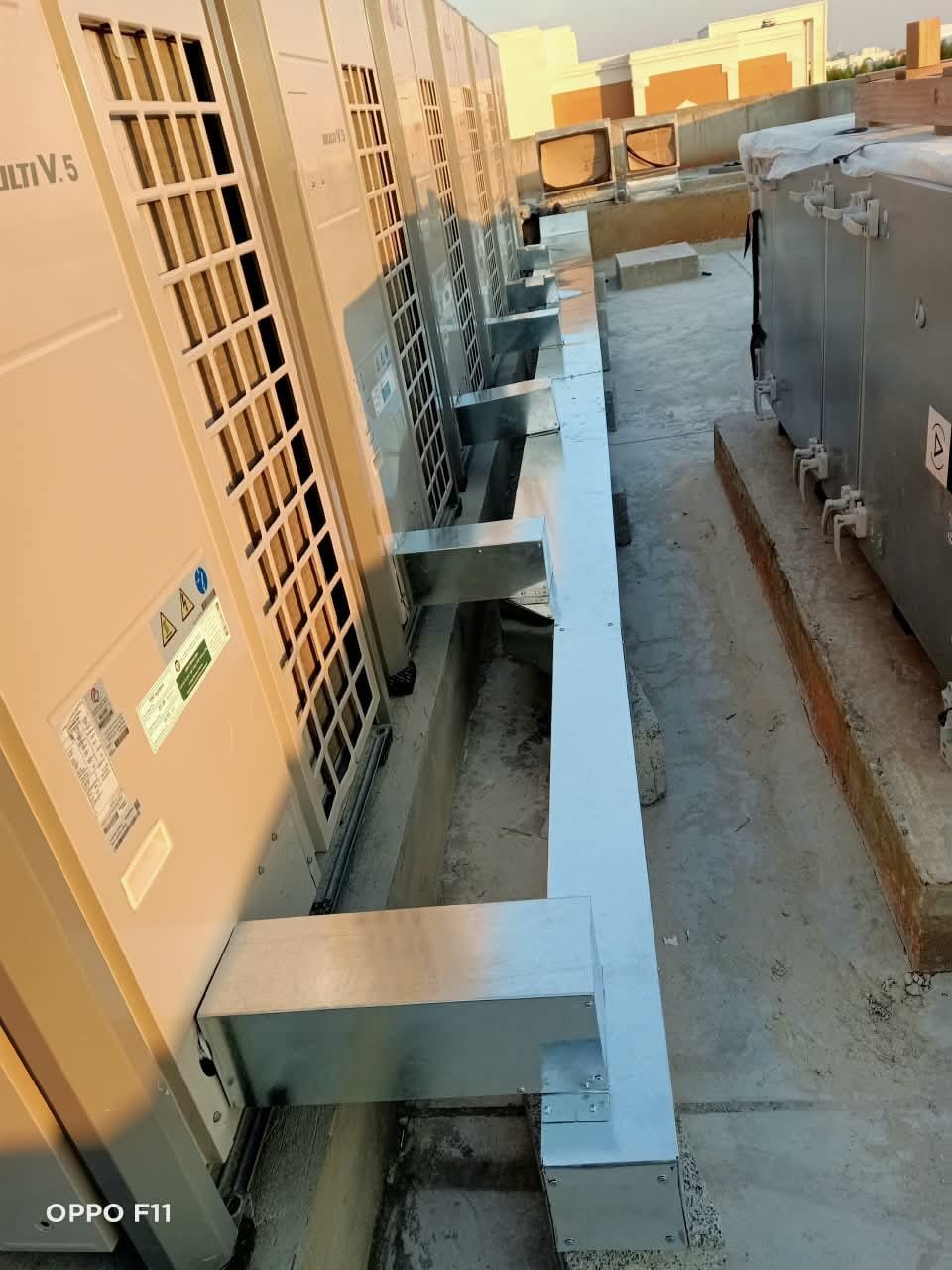 Rooftop AC unit and ductwork installation